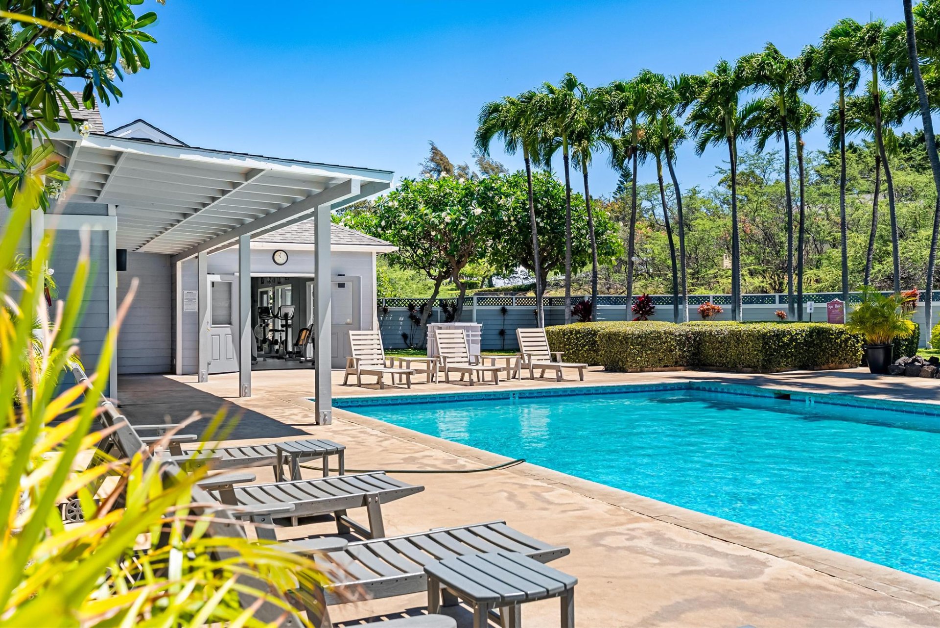 Pool deck with adjacent fitness room